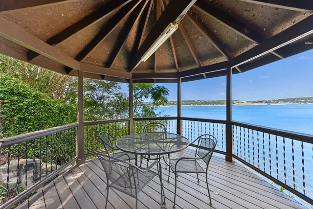 a view of a room with a kitchen