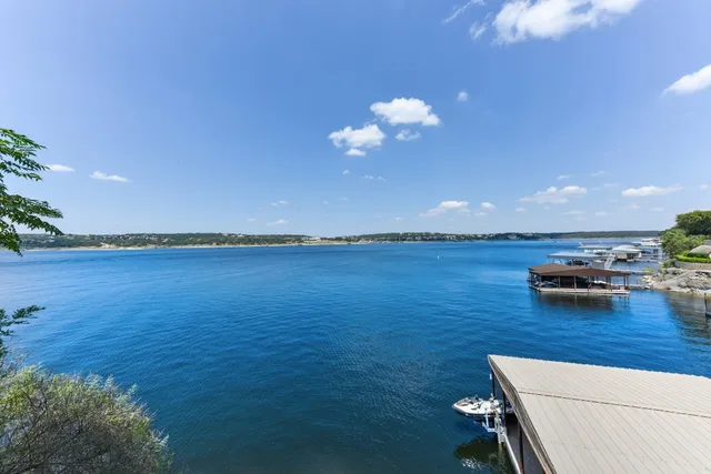 a view of a house with backyard porch and patio
