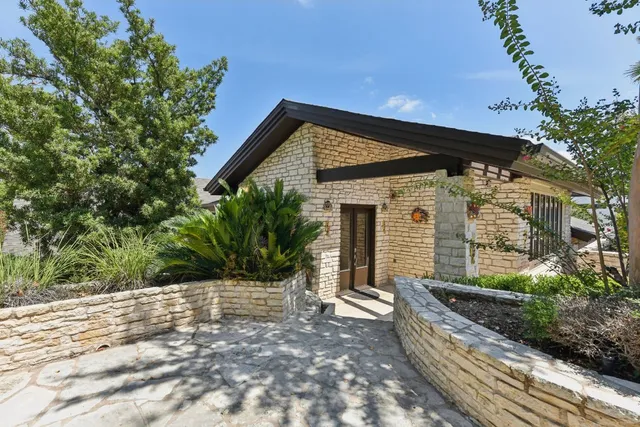 a view of a house with a patio