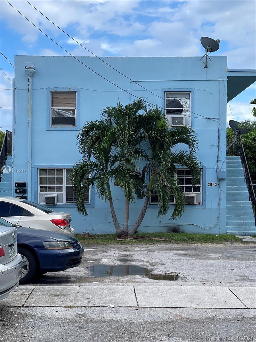 Opa-Locka Opa-Locka, FL 33054 - Photo 2 of 2 a cars parked on the side of the road