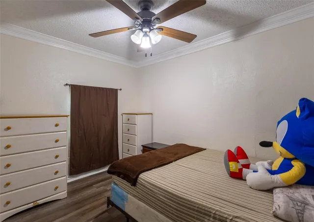 a bedroom with a bed and closet