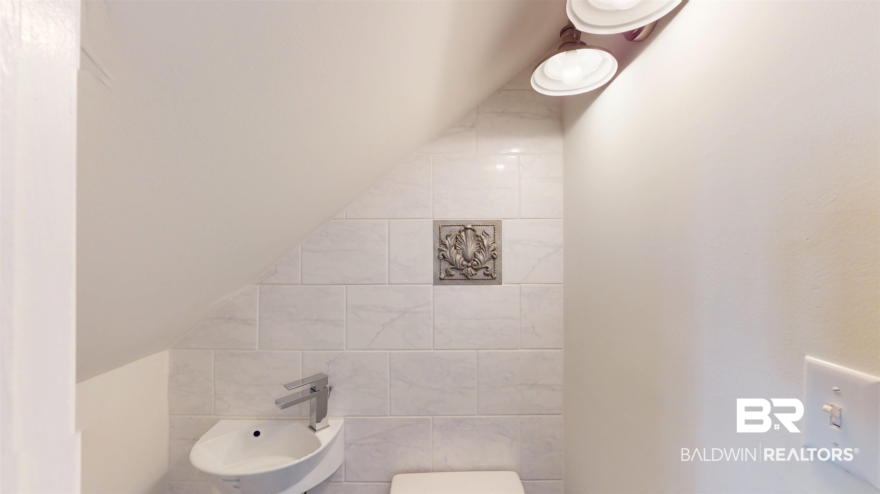 100 Du Rhu Drive, Unit J Mobile, AL 36608 - Photo 12 of 17 Half bathroom with tile walls and a bidet