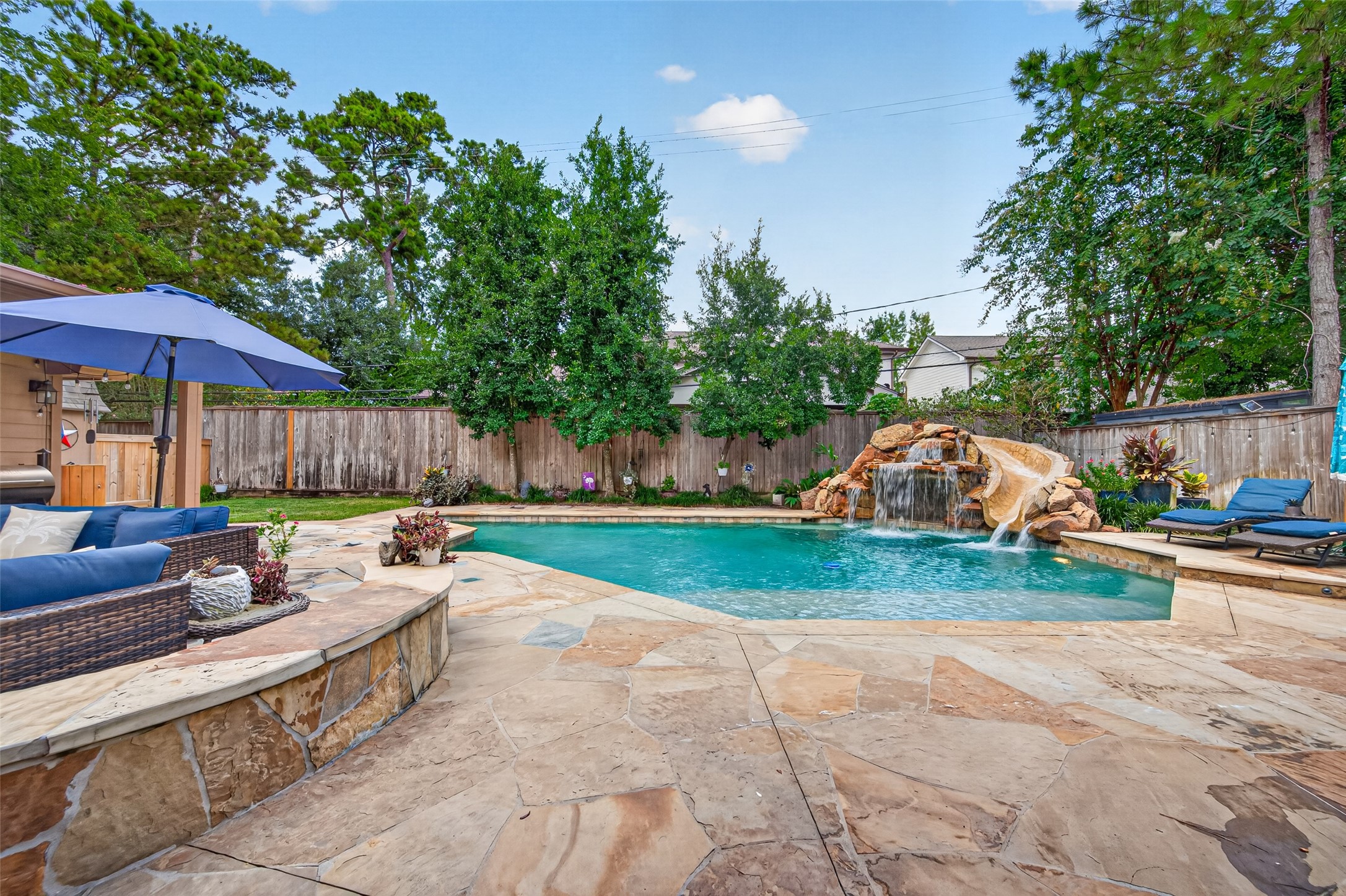 13506 Apple Tree Road Houston, TX 77079 - Photo 42 of 50 Gorgeous pool with waterfall and slide.