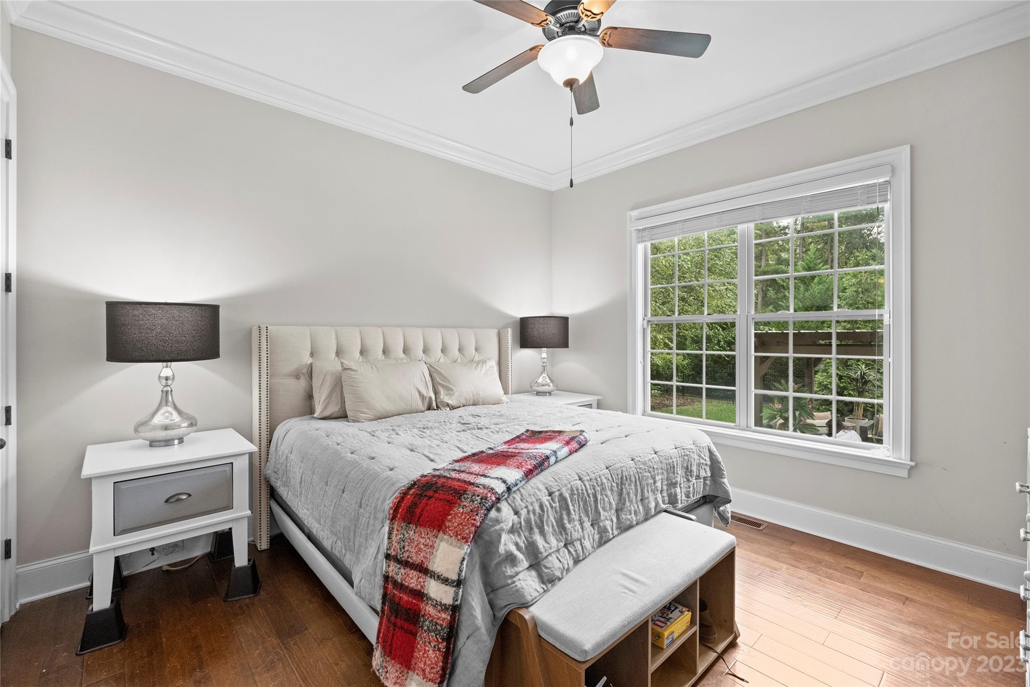 658 Zinnia Way Tega Cay, SC 29708 - Photo 12 of 32 a bedroom with a bed and a window