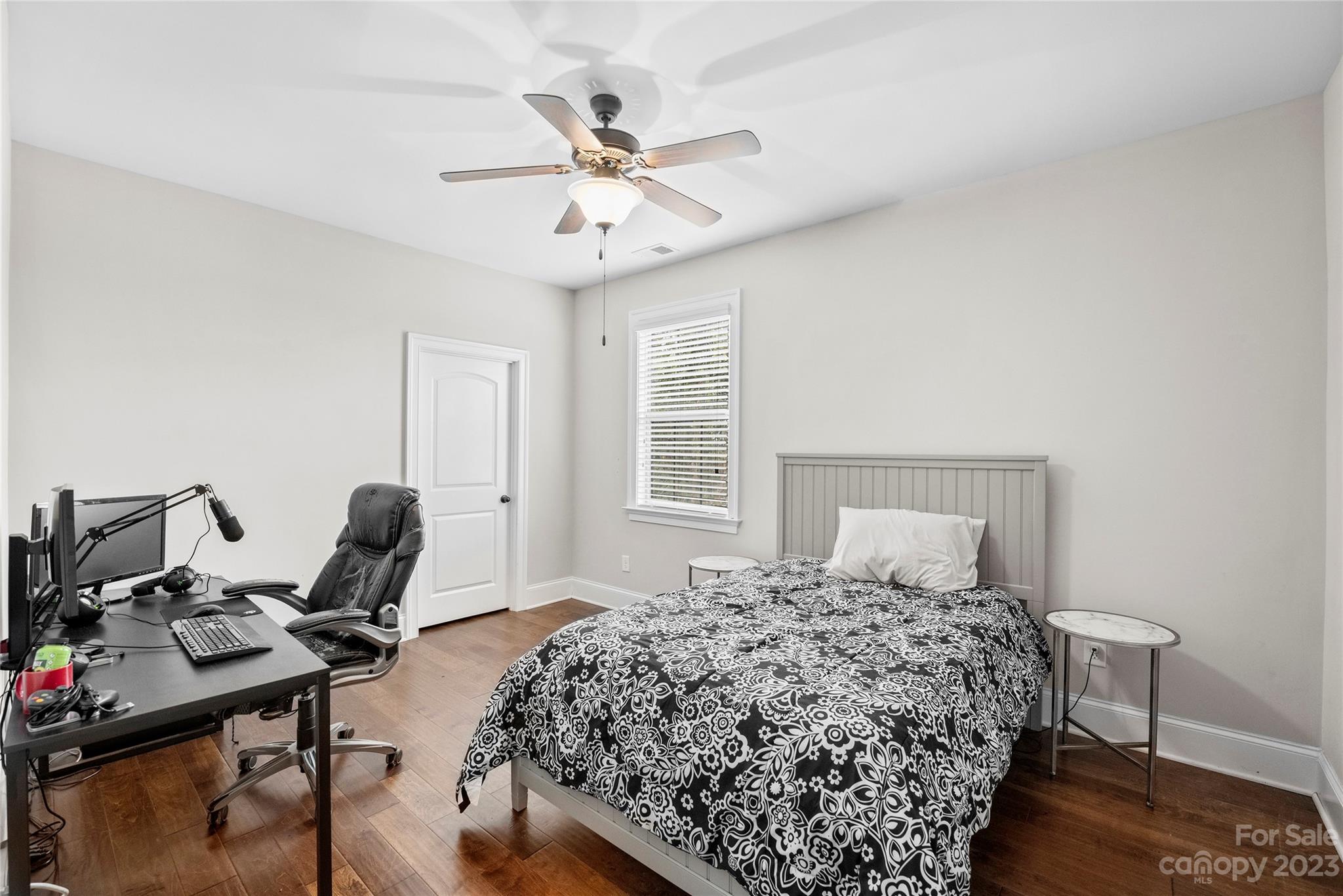 658 Zinnia Way Tega Cay, SC 29708 - Photo 24 of 32 a bedroom with bed and a window