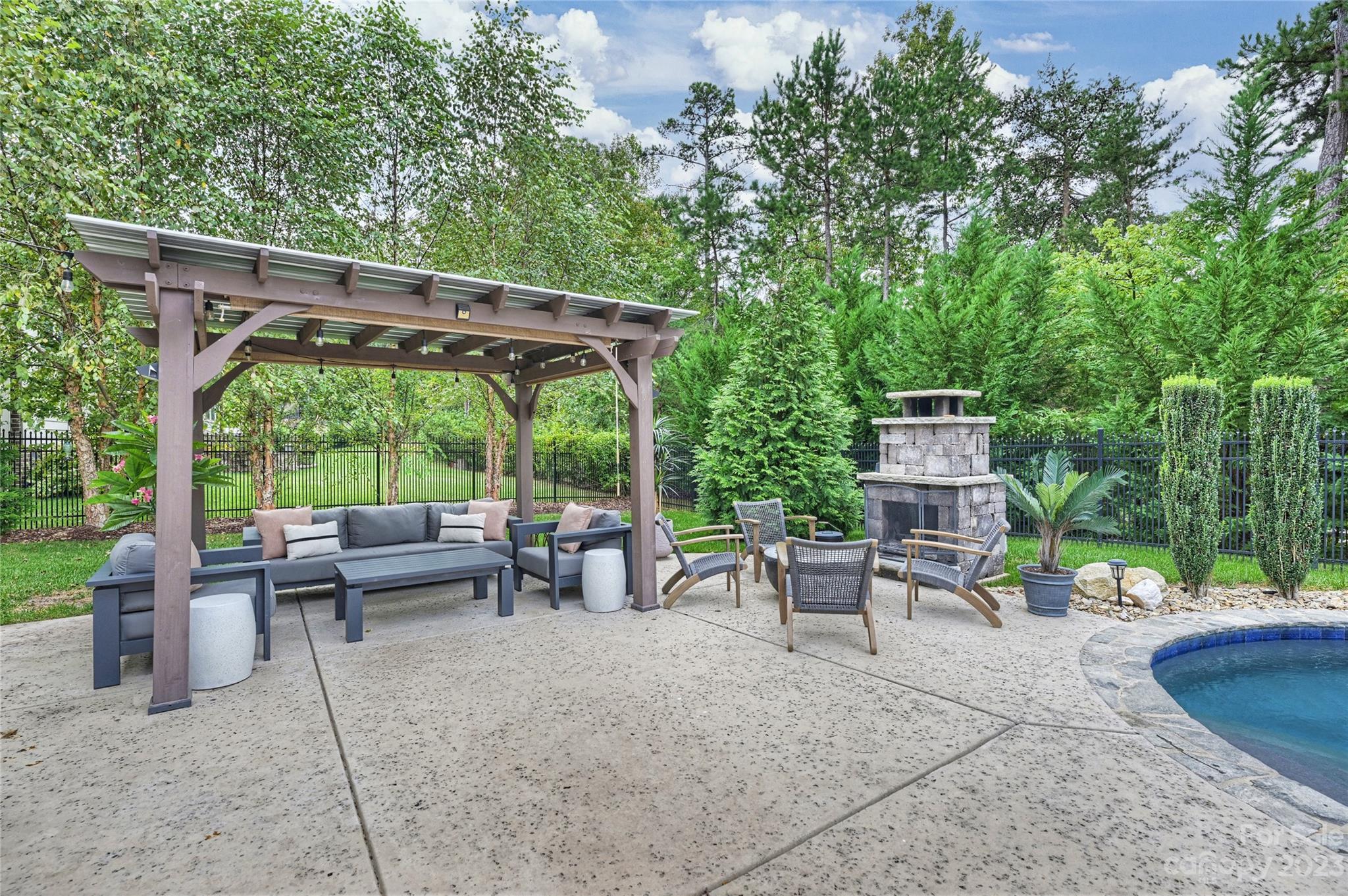 658 Zinnia Way Tega Cay, SC 29708 - Photo 30 of 32 a view of outdoor space yard deck and patio
