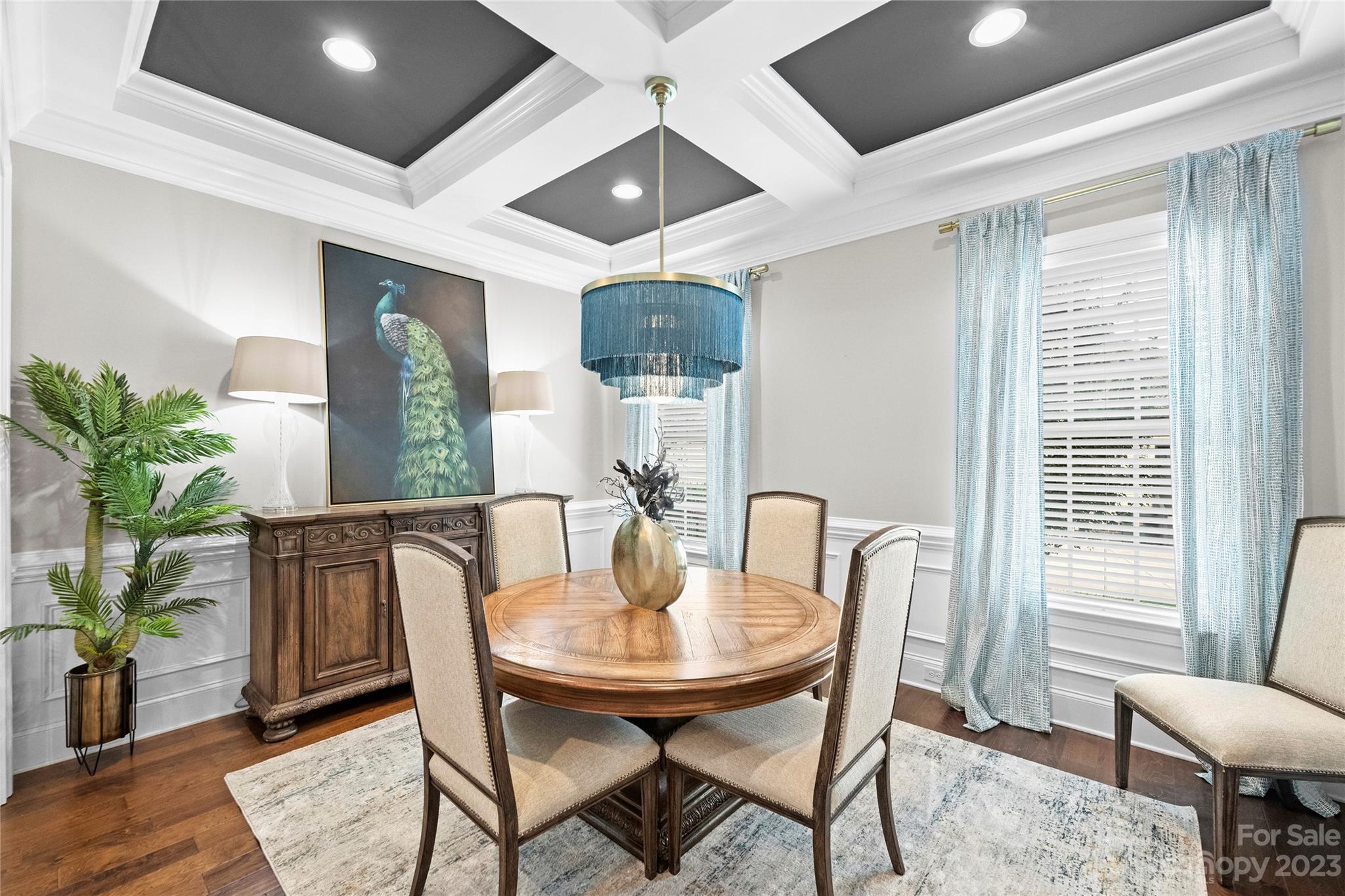 658 Zinnia Way Tega Cay, SC 29708 - Photo 6 of 32 a view of a dining room with furniture window and wooden floor