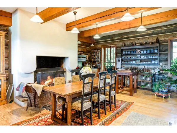 a dinning table and chairs in the patio