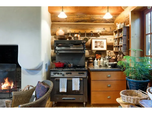 a kitchen with a stove and cabinets