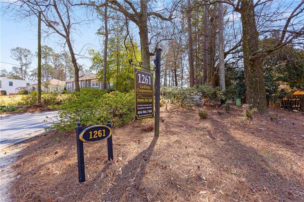1261 Lavista Road Northeast, Unit C3 Atlanta, GA 30324 - Photo 22 of 34 a view of a street with sign board