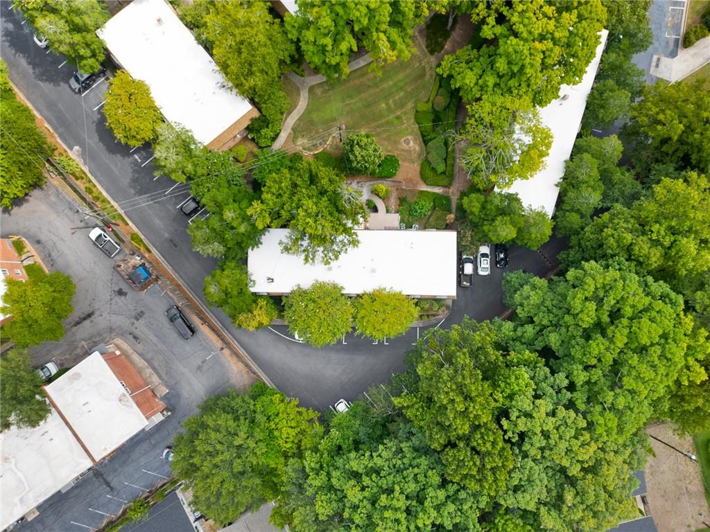 1261 Lavista Road Northeast, Unit C3 Atlanta, GA 30324 - Photo 31 of 34 an aerial view of a house with a garden