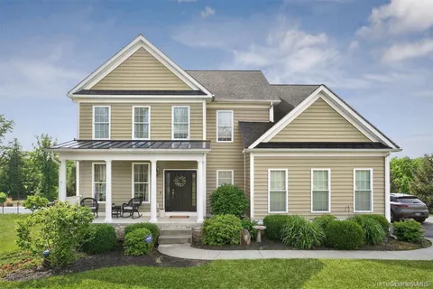 front view of a house and a yard
