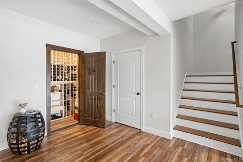 a view of entryway with wooden floor