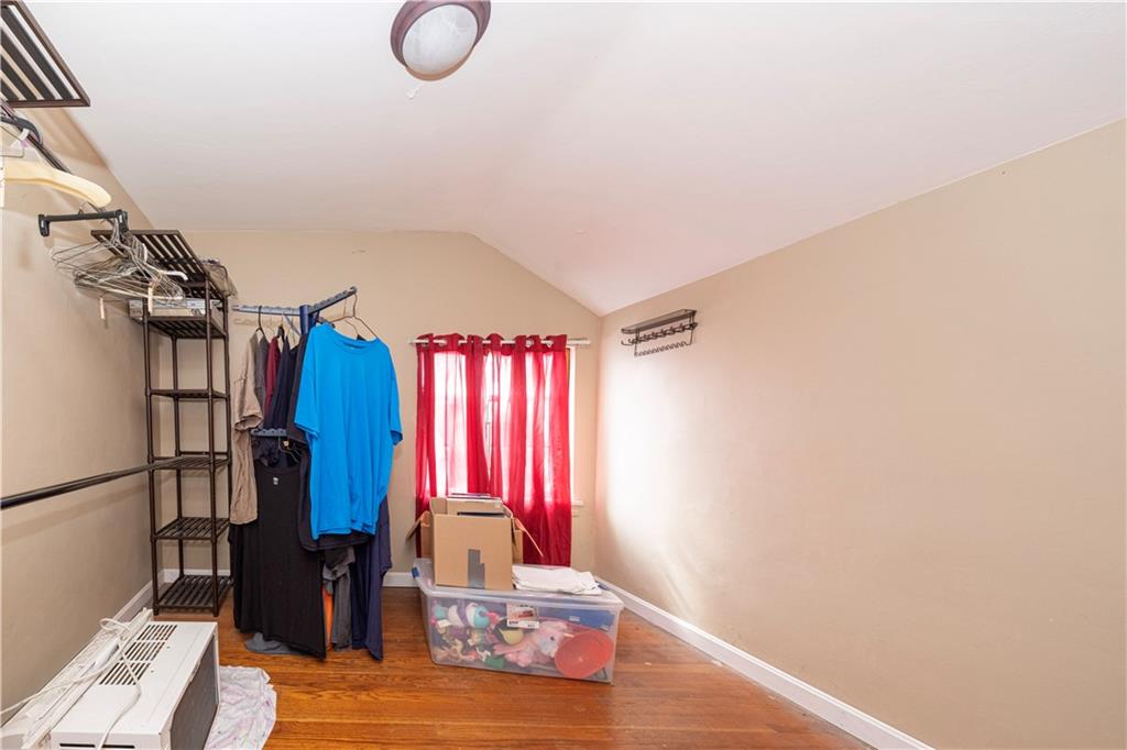 44 Forest Grove Road Coraopolis, PA 15108 - Photo 13 of 29 a view of a living room with clothes and shoes