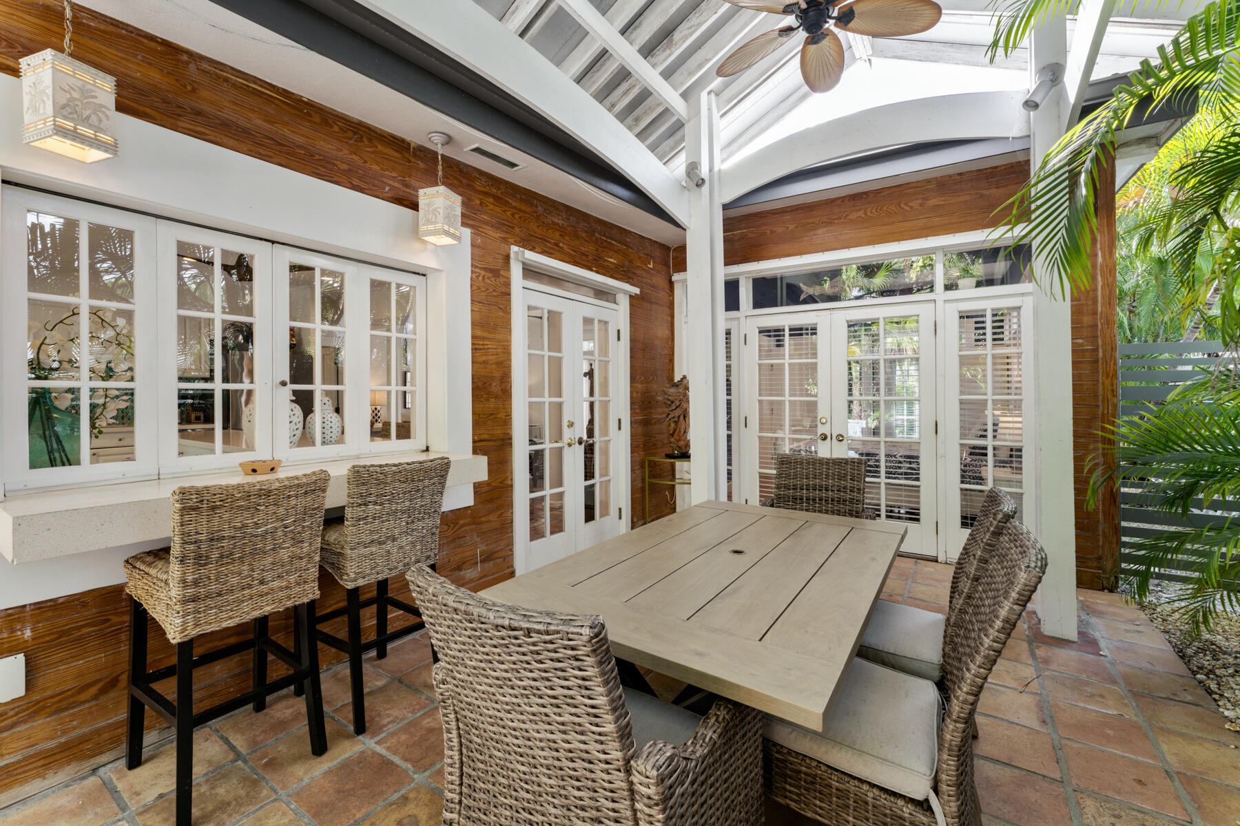 1511 Johnson Street Key West, FL 33040 - Photo 26 of 36 a view of a patio with table and chairs