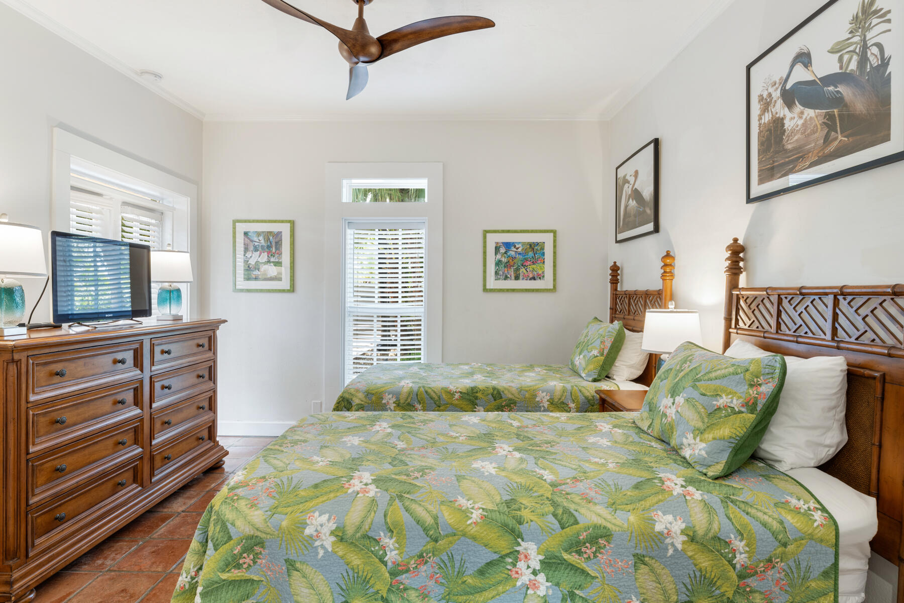 1511 Johnson Street Key West, FL 33040 - Photo 27 of 36 a bedroom with a bed and a television