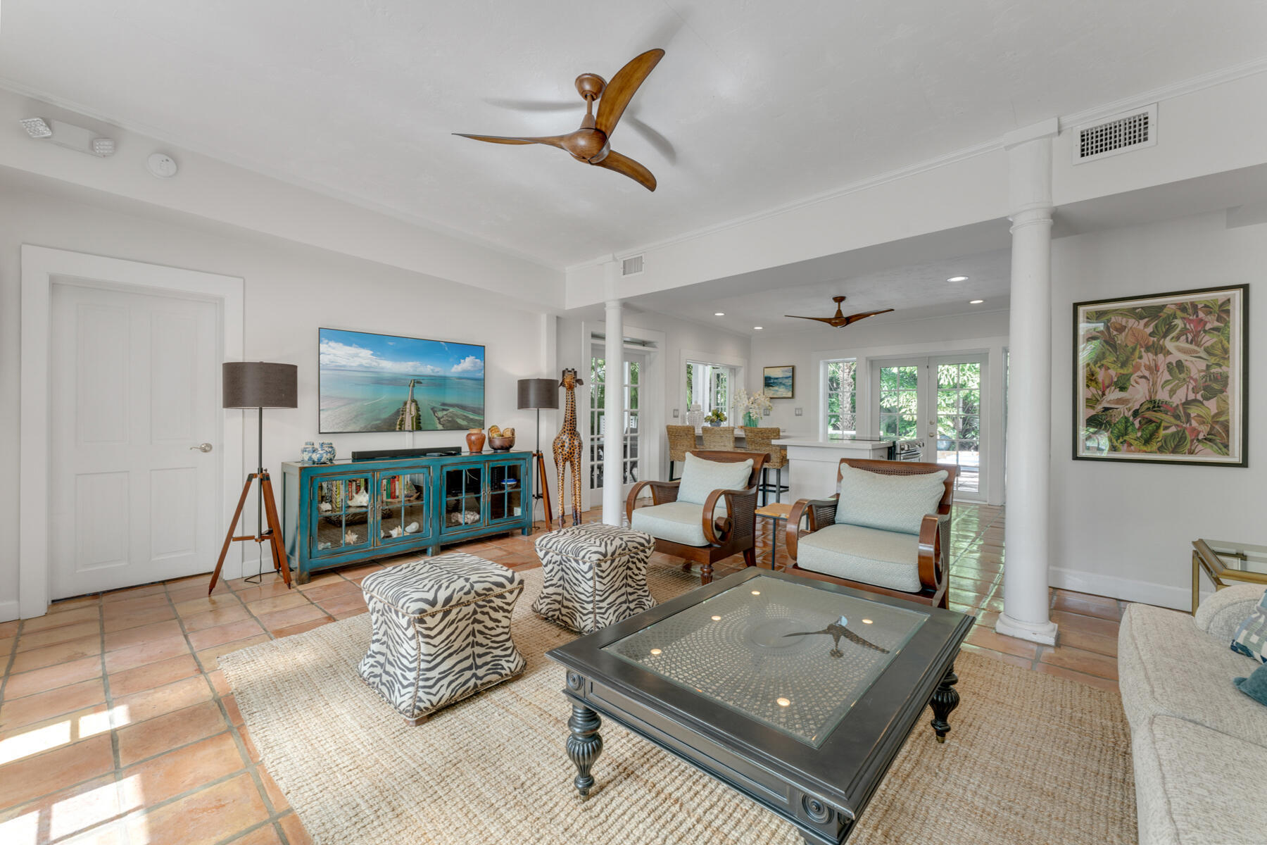 1511 Johnson Street Key West, FL 33040 - Photo 7 of 36 a living room with furniture and a flat screen tv