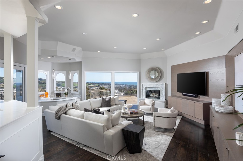 9 Wildflower Laguna Niguel, CA 92677 - Photo 11 of 47 a living room with furniture a flat screen tv and a large window