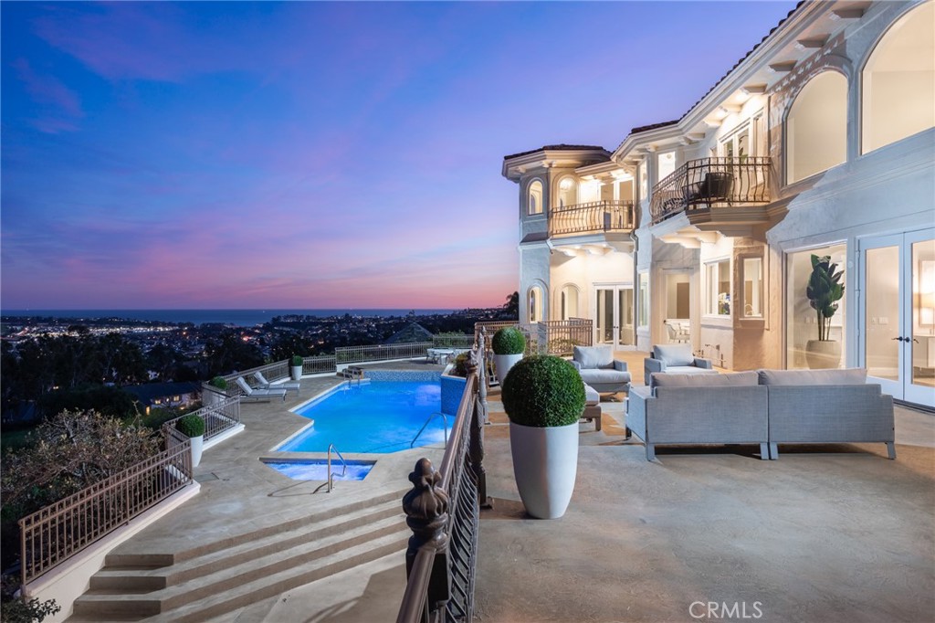 9 Wildflower Laguna Niguel, CA 92677 - Photo 2 of 47 a view of a patio with couches chairs and potted plants