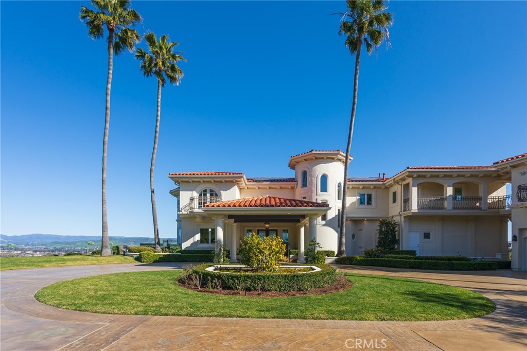 9 Wildflower Laguna Niguel, CA 92677 - Photo 43 of 47 a front view of a house with garden