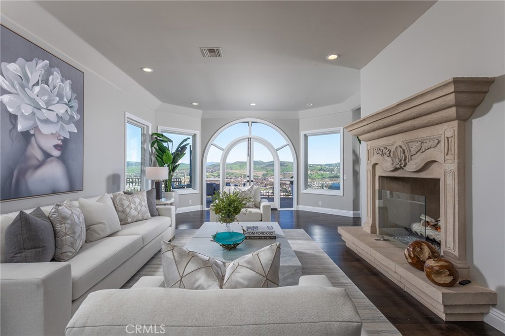 9 Wildflower Laguna Niguel, CA 92677 - Photo 7 of 47 a living room with furniture and a fireplace