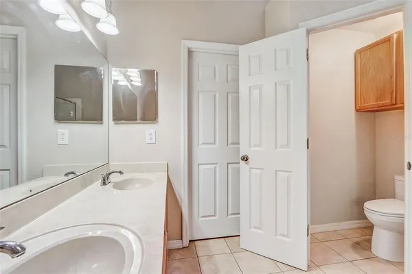 a bathroom with a sink and toilet