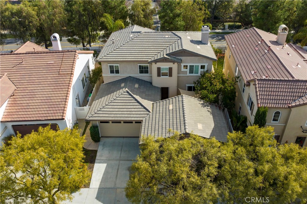 28817 Edenton Way Temecula, CA 92591 - Photo 44 of 56 a front view of a house with a garden