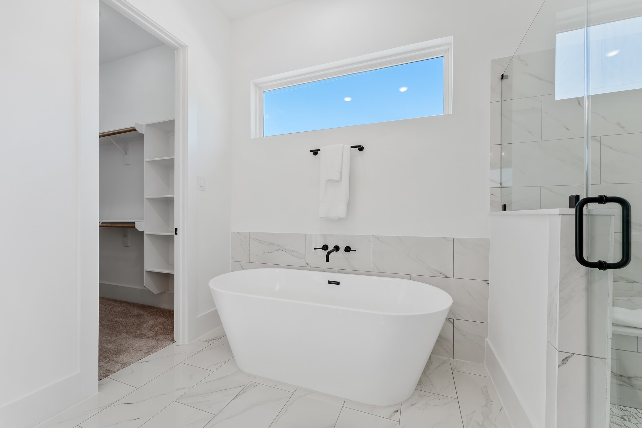 5630 Azores Houston, TX 77091 - Photo 25 of 33 a bathroom with a bathtub and shower