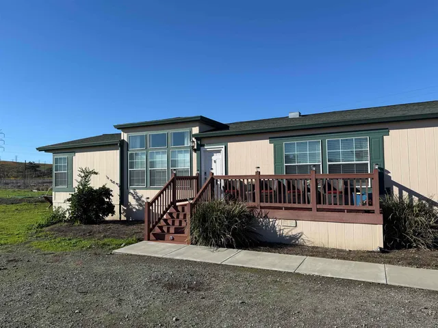 a view of a house with patio