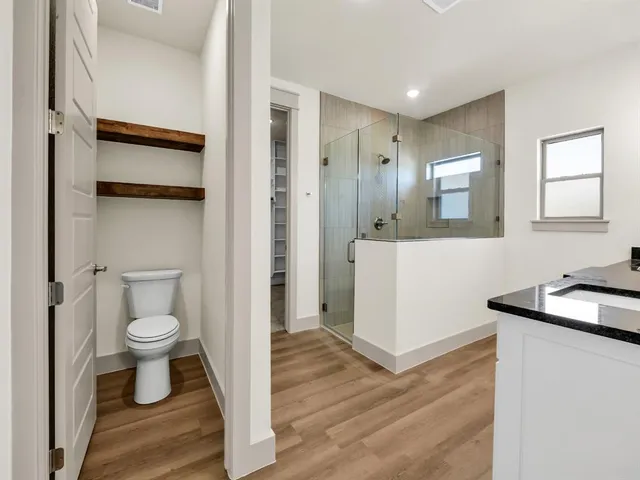 a bathroom with a sink and a toilet