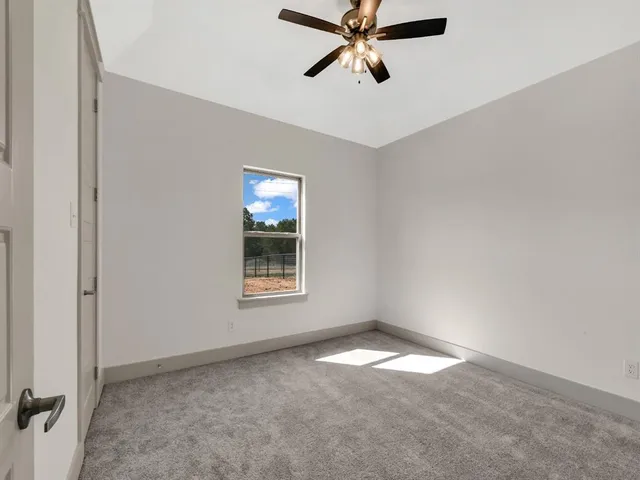 a view of a window in an empty room