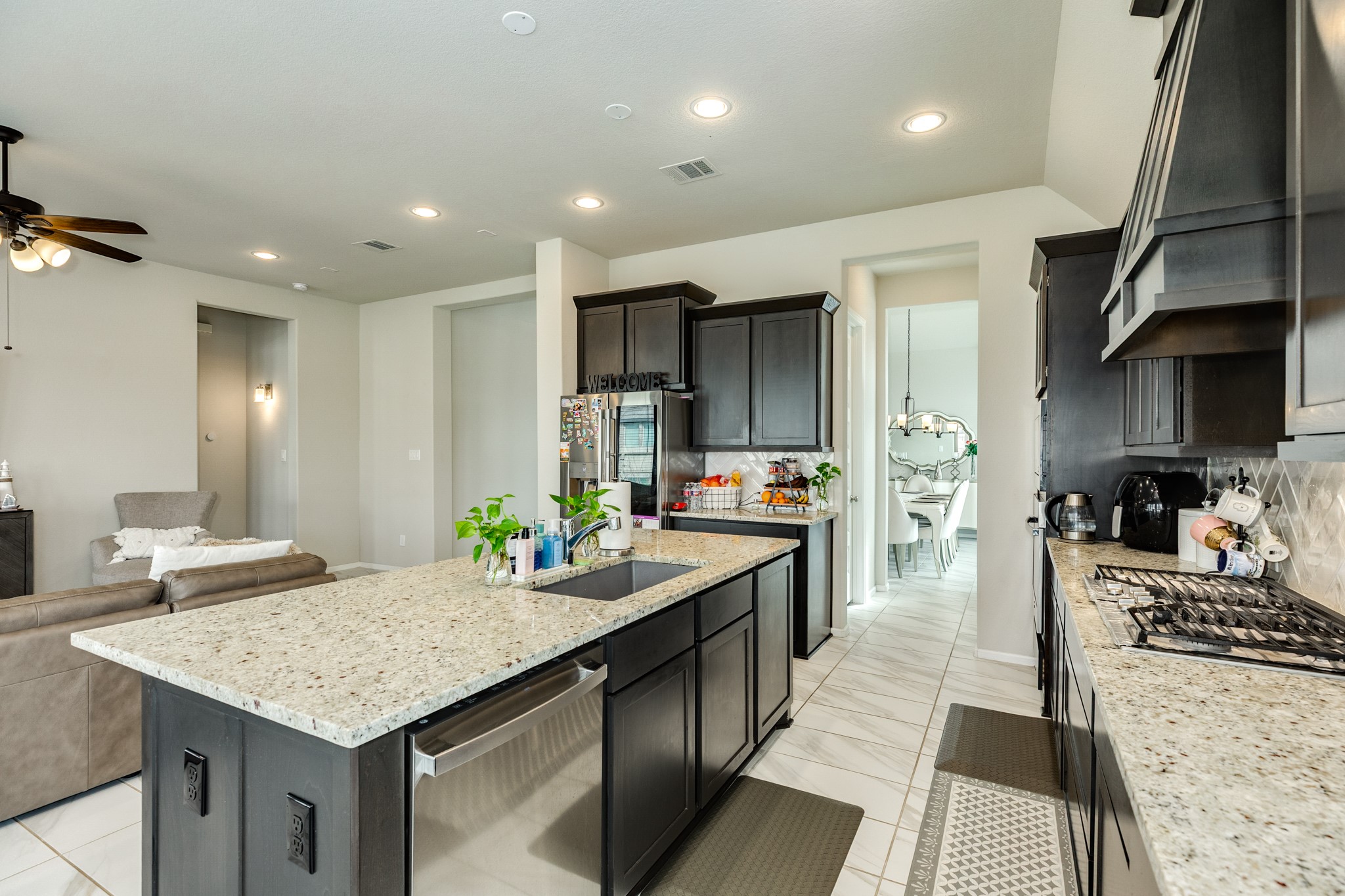 5138 Walnut Grv Lane Manvel, TX 77578 - Photo 16 of 43 a kitchen with counter top space appliances and cabinets