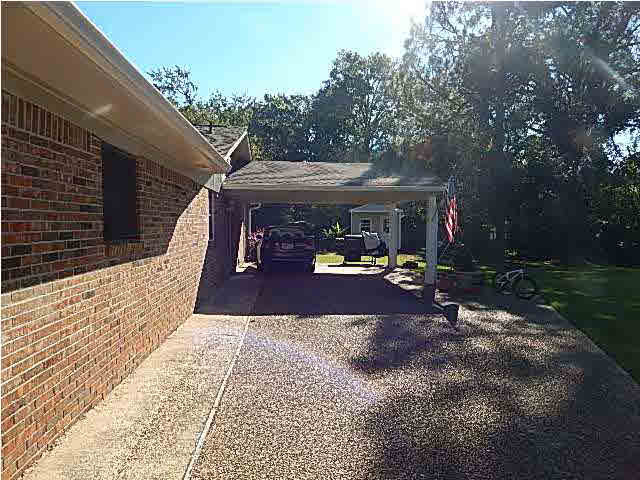 104 Rimrock Drive Clinton, MS 39056 - Photo 5 of 32 Side view of carport