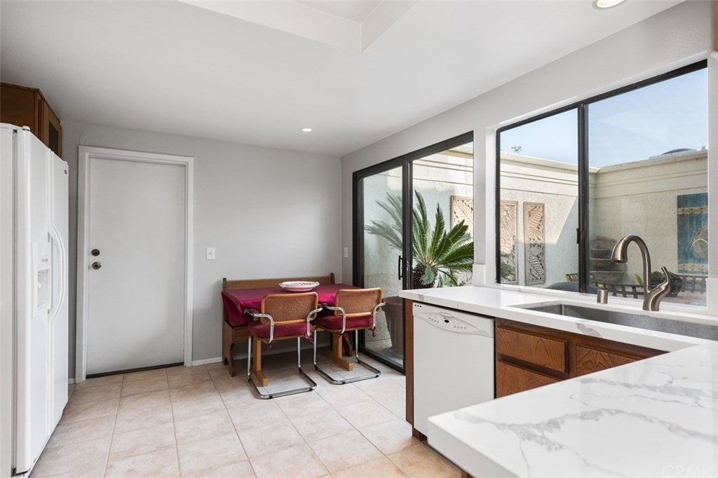 45 Morena Irvine, CA 92612 - Photo 12 of 49 Extra large basin stainless steel sink and quartz countertops.