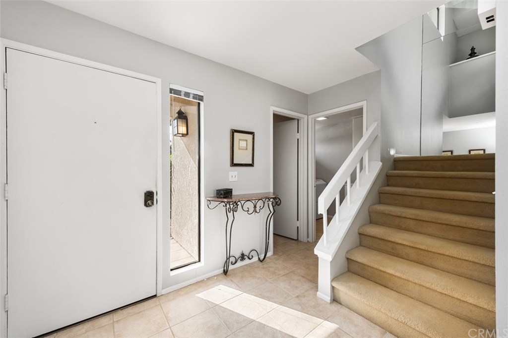 45 Morena Irvine, CA 92612 - Photo 22 of 49 Foyer with easy access to the powder room and separate laundry room.