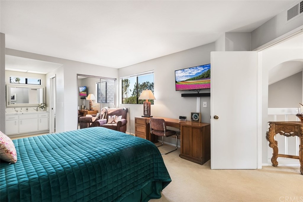45 Morena Irvine, CA 92612 - Photo 26 of 49 Large entry into Master Suite; view of vanity with New Quartz Counters and fixtures.