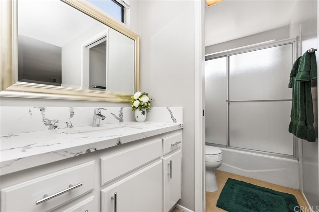 45 Morena Irvine, CA 92612 - Photo 29 of 49 Pocket door separates the private shower over the tub in the Master En-suite bathroom.