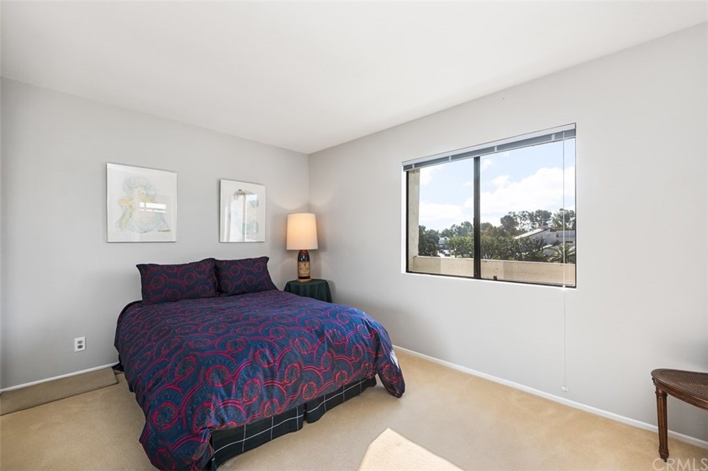 45 Morena Irvine, CA 92612 - Photo 31 of 49 Upstairs second bedroom. It has an en-suite bathroom, with walk-in full size shower, new countertops and fixtures.