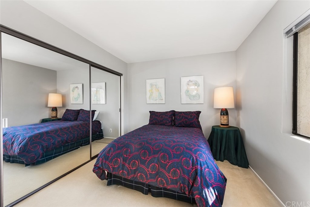 45 Morena Irvine, CA 92612 - Photo 32 of 49 Large mirrored wardbrobes in the second bedroom. Entire home is newly painted.