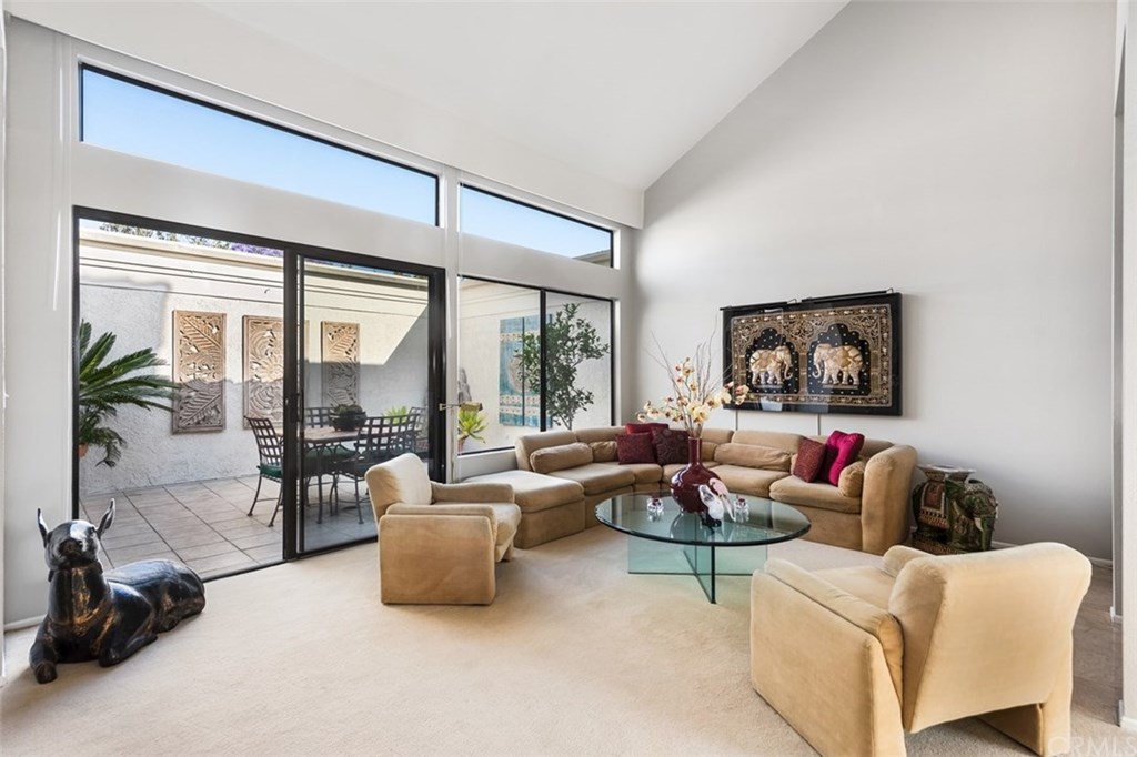 45 Morena Irvine, CA 92612 - Photo 4 of 49 Private interior tiled atrium is accessible through the large sliding door the living room.