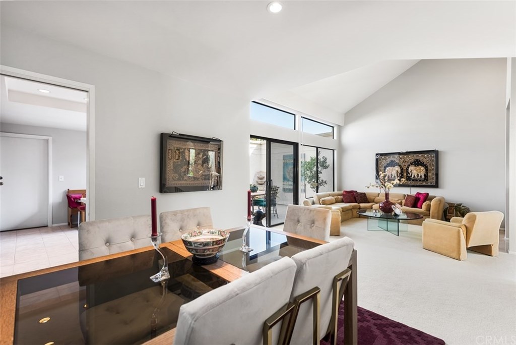 45 Morena Irvine, CA 92612 - Photo 5 of 49 View of both the living room and dining room. The kitchen, off to the left can be closed off with sliding pocket door or enjoy the quick accessibility from Kitchen to the dining table!