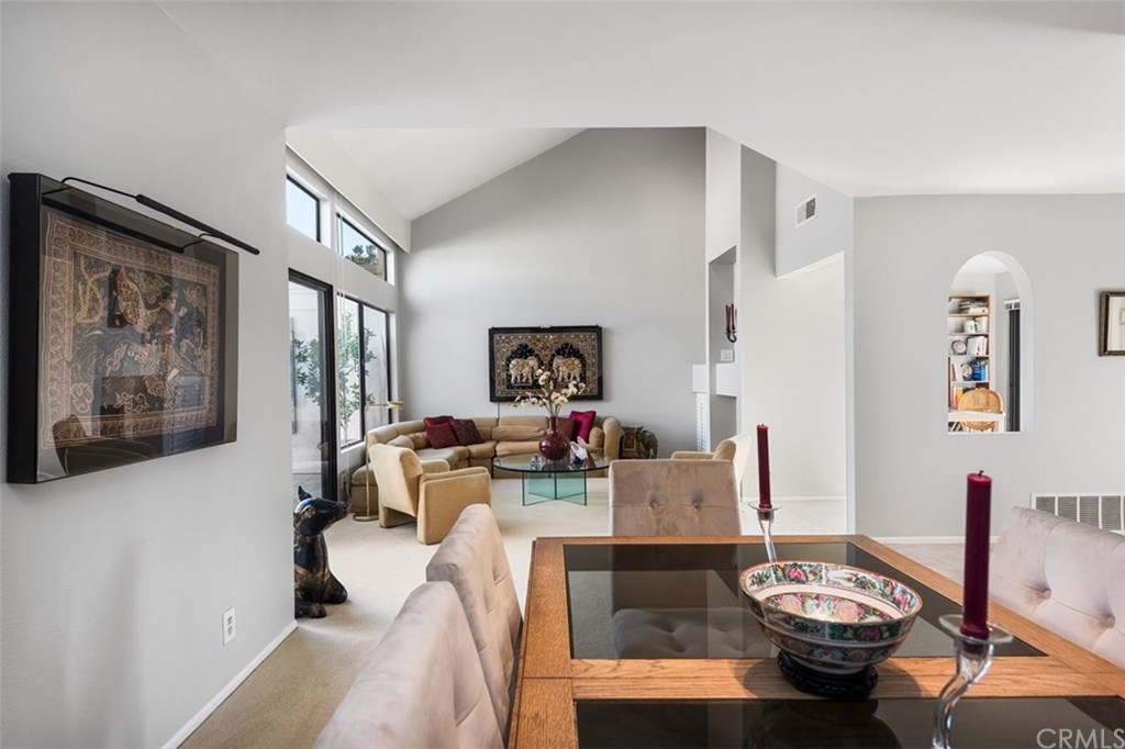 45 Morena Irvine, CA 92612 - Photo 6 of 49 A view of the dining room and living room with its own fireplace.