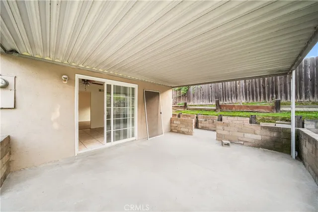 a room with furniture and a large window