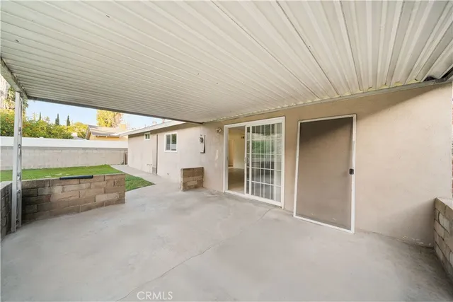 a view of an empty room with a sink