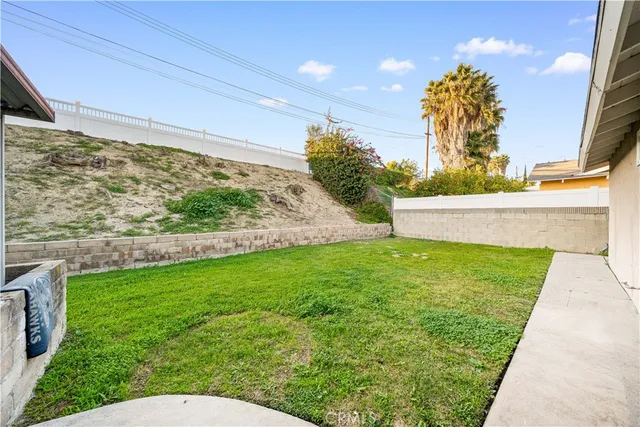 a view of a yard with an outdoor space