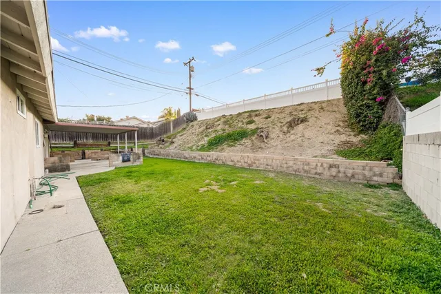 a view of a porch with a garden