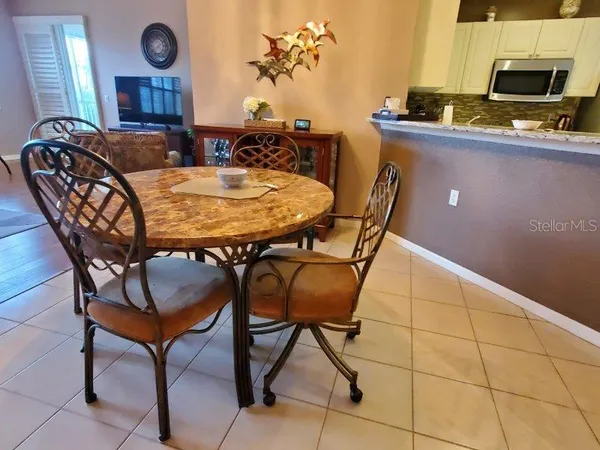 a view of a dining room with furniture
