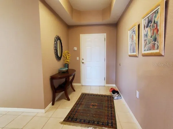 a view of a hallway with a couch