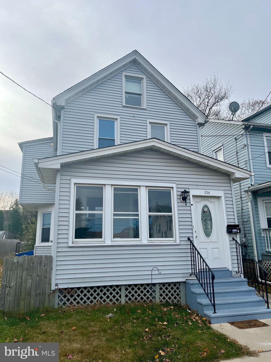 228 West 3rd Street, Unit 1 Florence, NJ 08518 - Photo 1 of 1 a front view of a house with a yard