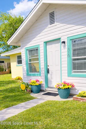 a view of livingroom with hardwood floor and furniture